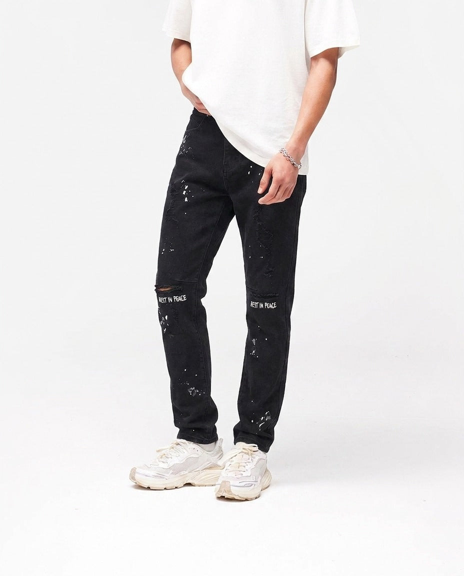 BLACK PAINT SPLATTER JEANS