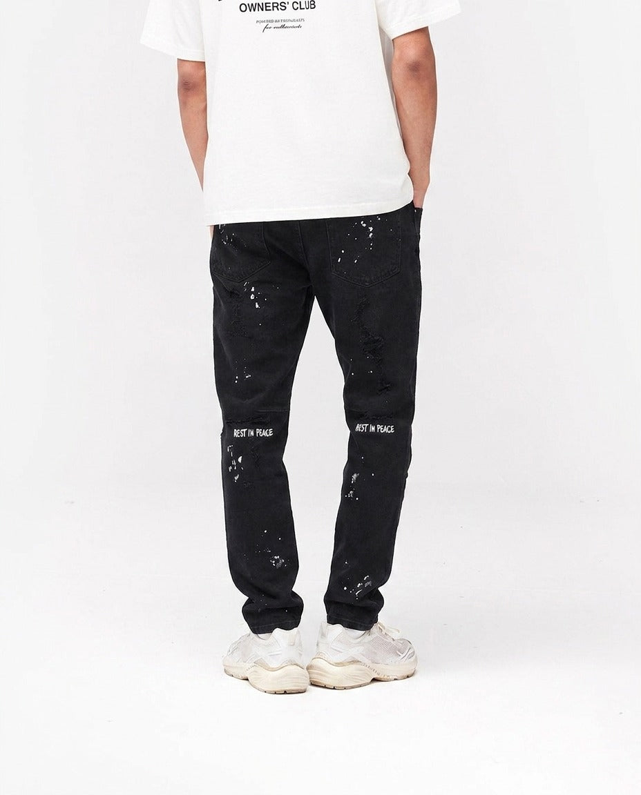 BLACK PAINT SPLATTER JEANS